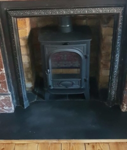Stovax Stove In Fireplace Chamber Image